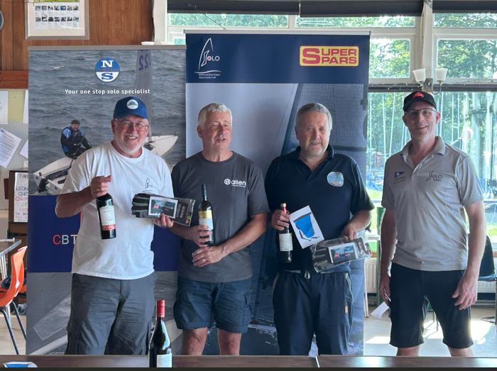 a-group-of-men-holding-bottles-and-wine-ai-genera A group of men holding bottles and wine AI-generated content may be incorrect.