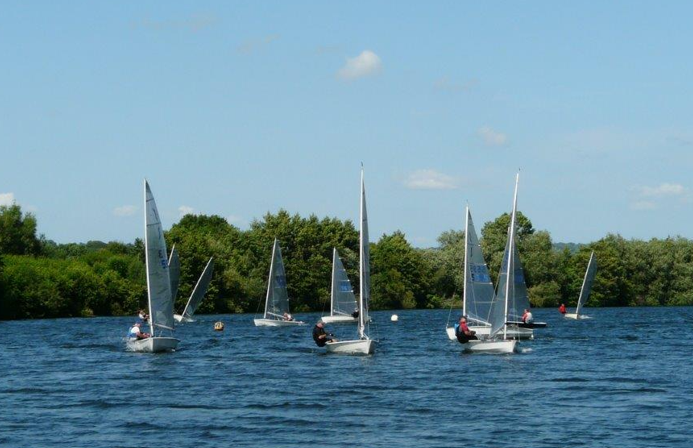 several-sailboats-on-a-lake-ai-generated-content Several sailboats on a lake AI-generated content may be incorrect.